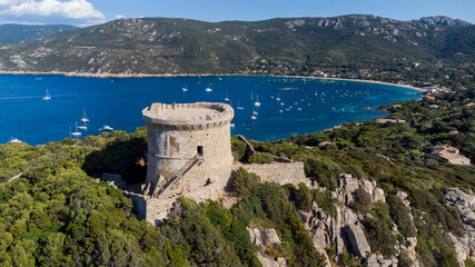 Aerial view of the ruins of the Genoese tower on Campomoro Cape in the South of Corsica, France -...