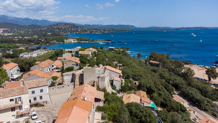 Naklejka na ściany i meble Aerial view of the Bastion de France in Porto-Vecchio in the South of Corsica, France - Medieval citadel by the Genoese in front of the Mediterranean Sea