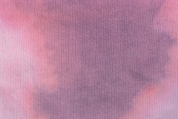 Trendy Tie-Dye fabric. Cotton background texture for design. Pink texture for any background. Ecologically grown cotton.