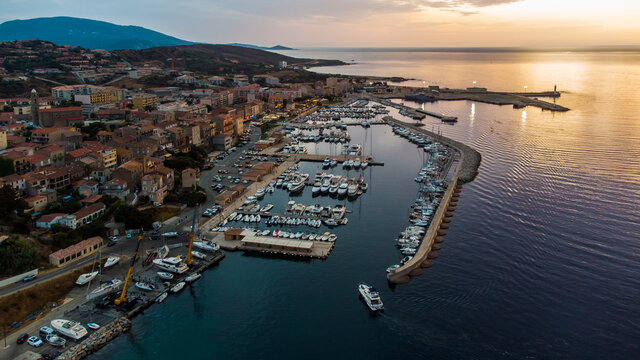 Aerial view of the marina of Propriano in the South of Corsica, France - Small coastal town in the Mediterranean Sea