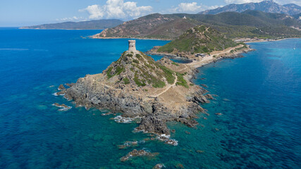 Aerial view of the remains of the Genoese Tower of La Parata built on an overlook at the end of a cape near Ajaccio in Corsica, France