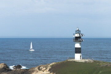 Seascape whit the lighthouse of 'Pancha island' in the coast of Ribadeo, Galicia, Spain