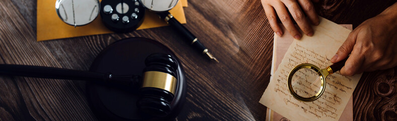 justice and law concept.Male judge in a courtroom on wooden table and Counselor or Male lawyer...