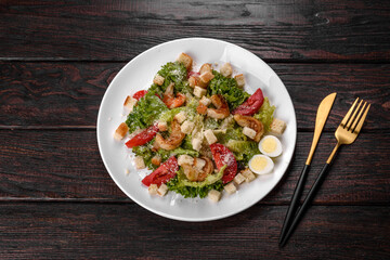 Delicious fresh salad with shrimp for the festive table