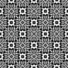 Flower geometric pattern. Seamless vector background. White and black ornament. Ornament for fabric, wallpaper, packaging. Decorative print.