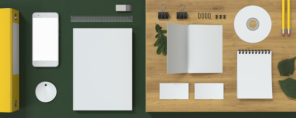 Book, phone, booklet Trifold, CD, business cards and a notebook on a background of green fabric and light wood. For presentations and portfolios of graphic designers.