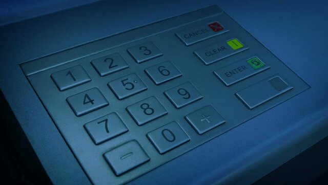 Person Uses ATM In The Evening (Any Currency)