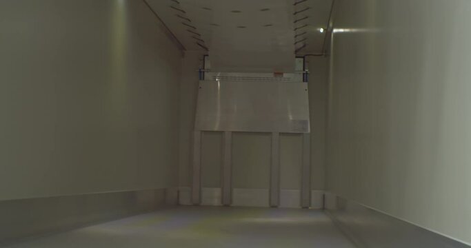 modern freight transport.shot inside a cargo empty clean semi-trailer.Back view close-up.