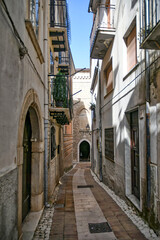 Naklejka na ściany i meble A narrow street in Monteroduni, a medieval town of Molise region, Italy.