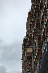 Scaffolding on an office building being converted to residential apartments 