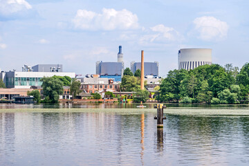 Fototapeta na wymiar River Havel in the district Haselhorst with the Reuter West cogeneration plant in Berlin, Germany