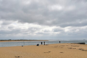 Fototapeta na wymiar Fishermen at seaside in Brittany France
