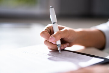 Lawyer Signing Business Contract Paper Document
