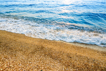 Empty tropical beach, and clear blue water. aerial view.