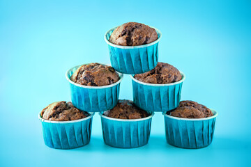 Sweet fresh chocolate muffins with chocolate slices