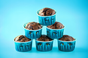 Sweet fresh chocolate muffins with chocolate slices