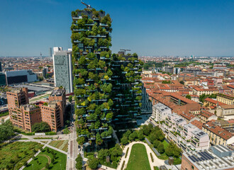 Aerial view of Vertical forest (Bosco Verticale) building in Milan. Residential buildings with many trees and other plants in balconies