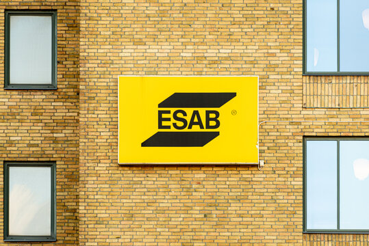 Logo of ESAB company in a brick wall..