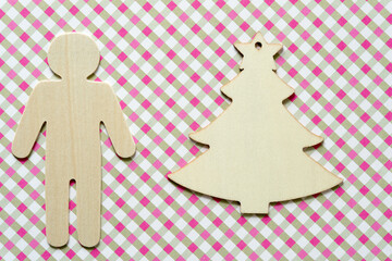 silhoutte shape of a man a christmas ornament in the shape of a tree