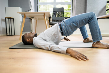 African American Doing Office Exercise Workout