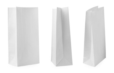 Set with paper bags on white background