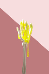 Modern Halloween concept with green slime and skeleton hand. Bizarre concept.