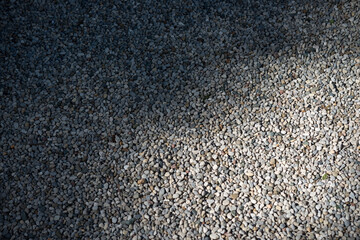 pea pebble path with sunlight and shade effect