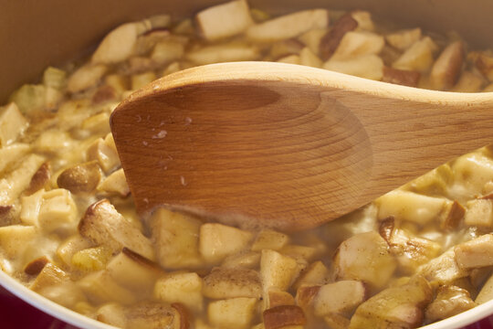 Sliced wild mushrooms in a frying pan.
