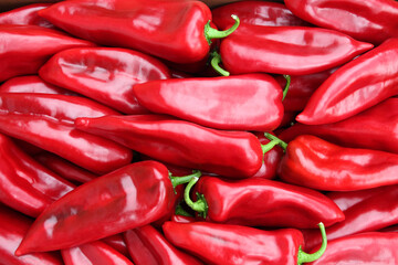 Heap of ripe big red peppers. 