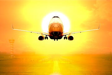 Passenger aircraft takeoff on runway of airport in sunset