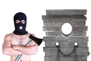 Executioner and axe with pirated shackles on a wooden wall torture isolated on white background...