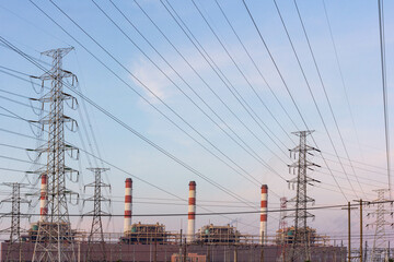 Gas turbine electrical power plant and high voltage electric pole with sunrise