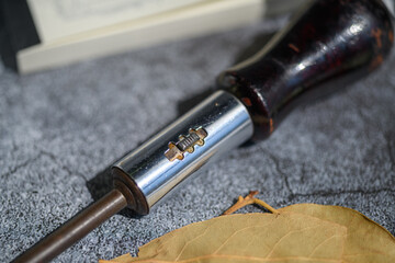Naklejka premium 錆びたマイナスドライバー/ Rusted flat-blade screwdriver