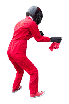 Technician maintaining service for a racing car in pit stop isolated on white background with clipping path