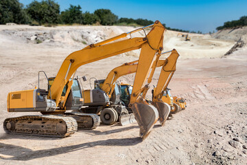 Group heavy machinery for open pit mine, digging for coal of extractive industry.