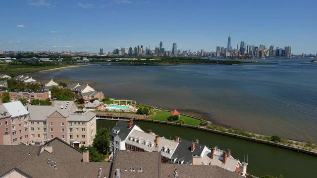 Distant Aerial Slider Shot of the Manhattan, Brooklyn and Statue of Liberty Skyline