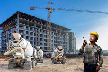 Foreman control working by radio communication at high building construction site