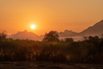 sunrise sky on mountains and forest