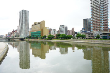 Obraz na płótnie Canvas Cityscape of Kokura with Murasaki river, Northern Kyushu, Fukuoka - 北九州 福岡 小倉の街 紫川