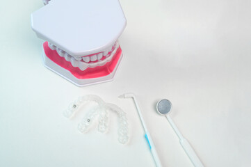 Invisalign braces and tools for dental care, dental healthcare and Orthodontic concept.