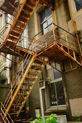 Fototapeta premium Vintage outdoor staircase - 古い外階段