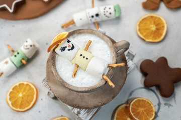 christmas background with hot chocolate and snowman