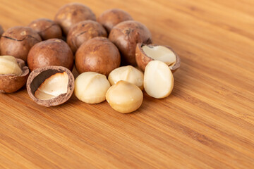 Macadamia nuts on wooden table