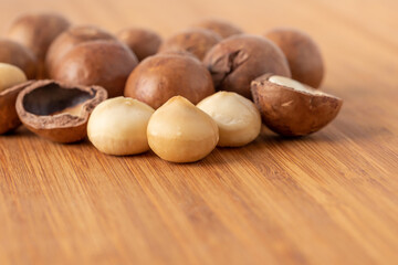 Macadamia nuts on wooden table