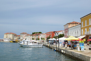 Fototapeta na wymiar Coastline and harbor of Porec, Istria, Croatia