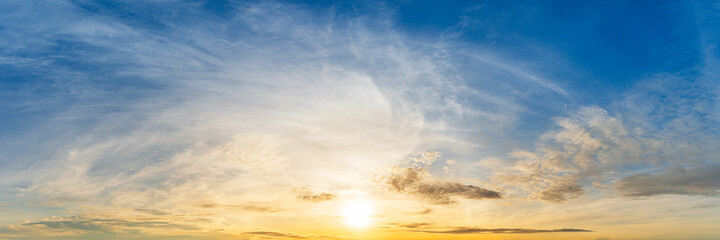 Naklejka na ściany i meble Bright sunrise on cloudy sky panoramic view background