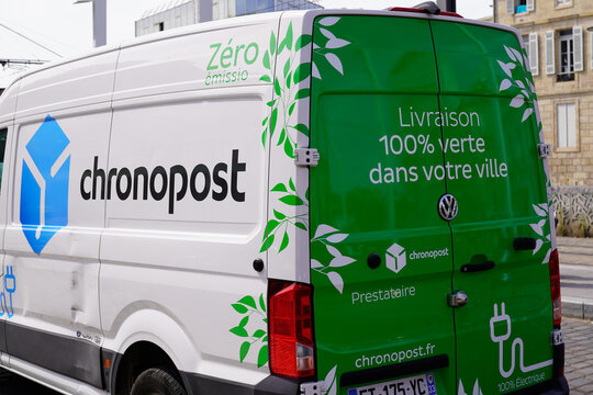 Chronopost electric delivery van sign logo and brand text on panel truck post french transport courier