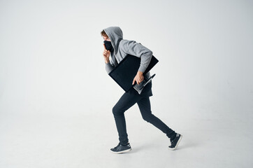 masked man stealth technique robbery safety hooligan light background