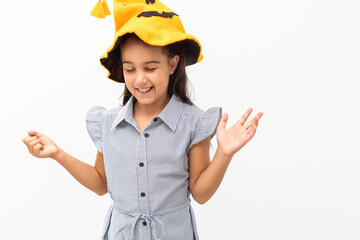 little girl in a witch hat. halloween.