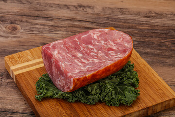 Beef ham piece over board